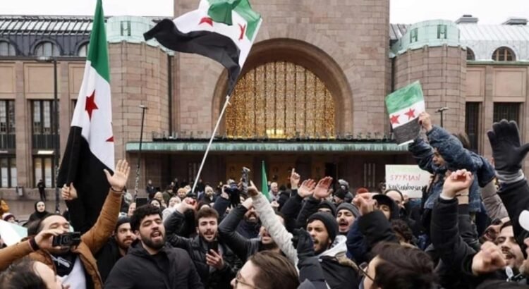 Sirios celebran caída de Al Asad